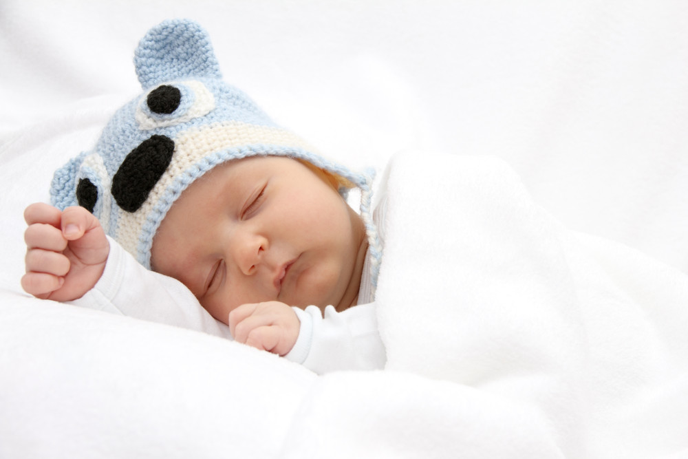 baby with heat rash sleeping